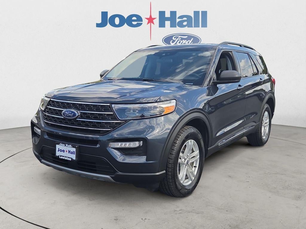 2022 Ford Explorer XLT in Stone Blue Metallic — front three-quarter view