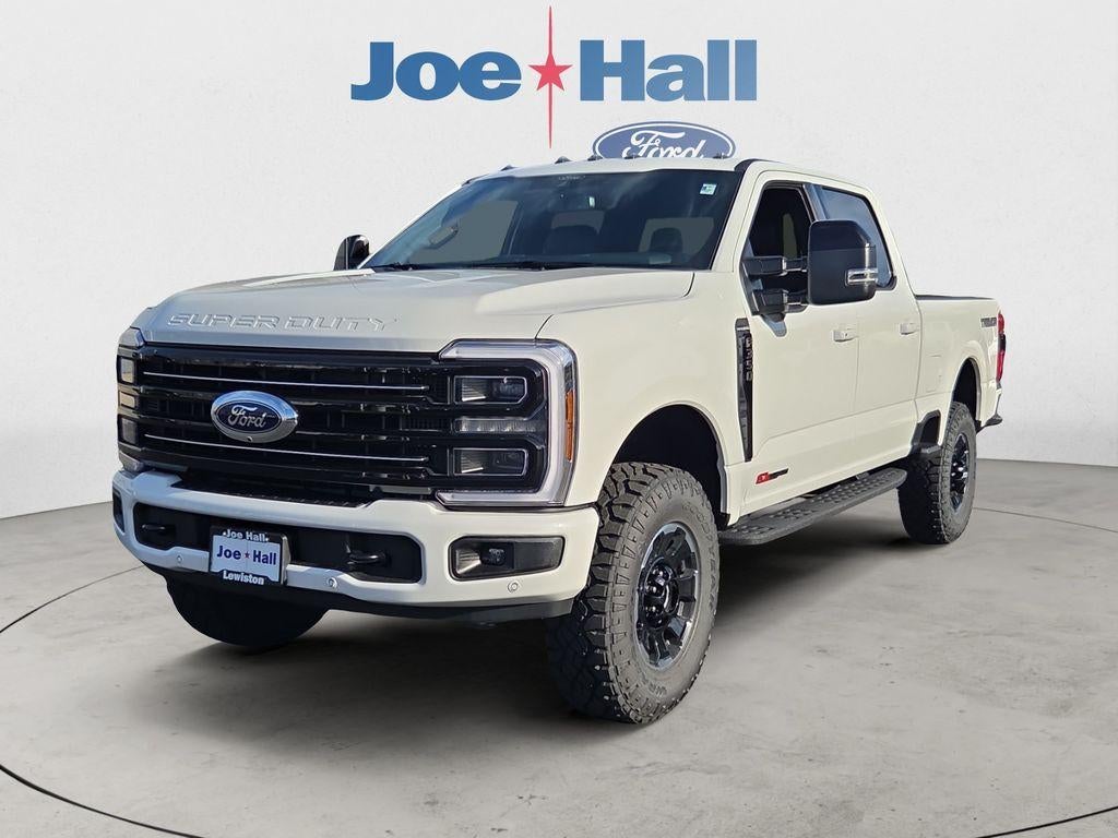 2026 Ford F-350 Platinum in Star White Metallic Tri-Coat — front three-quarter view