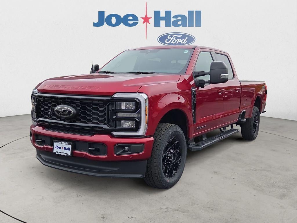 2026 Ford F-350 LARIAT in Ruby Red Metallic Tinted Clearcoat — front three-quarter view