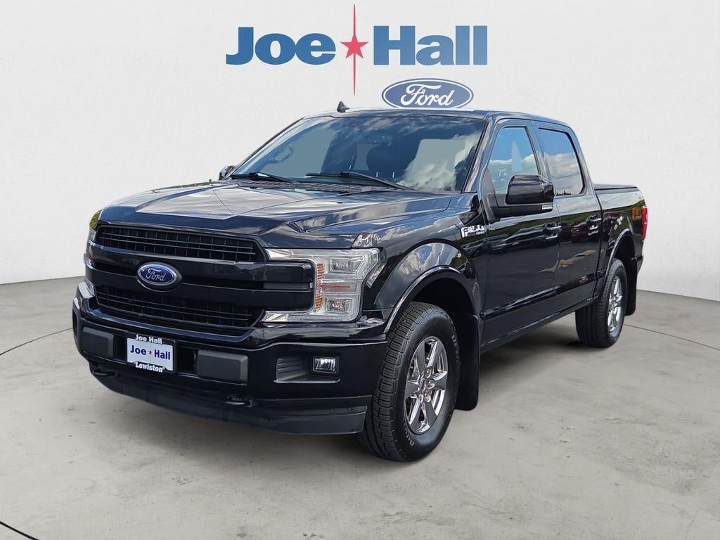 2019 Ford F-150 LARIAT in Agate Black Metallic — front three-quarter view