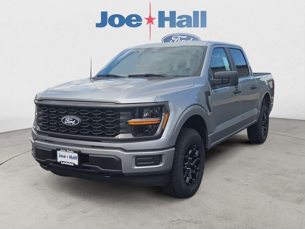 2026 Ford F-150 STX in Iconic Silver Metallic — front three-quarter view