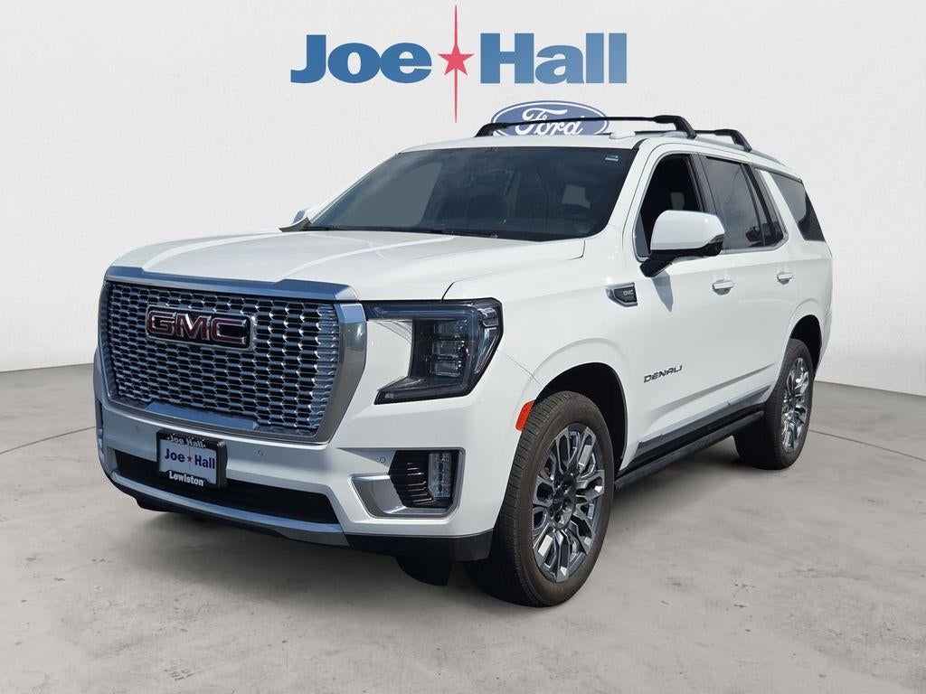 2022 GMC Yukon Denali in Summit White — front three-quarter view