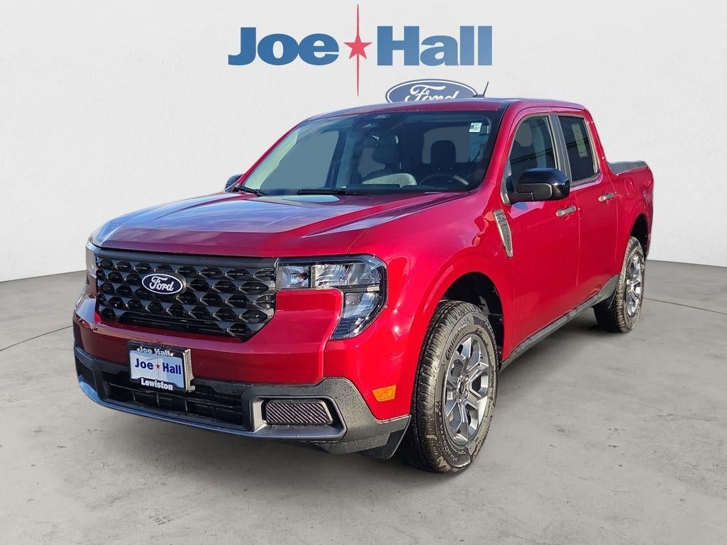 2026 Ford Maverick XLT in Ruby Red Metallic Tinted Clearcoat — front three-quarter view