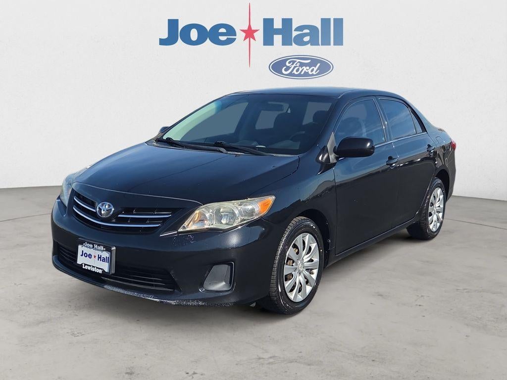 2013 Toyota Corolla LE in Black Sand Pearl — front three-quarter view